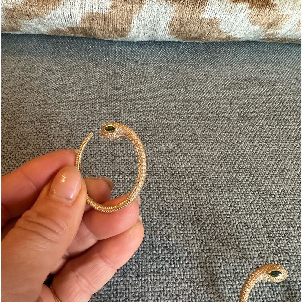 Gold side hoops with emerald green eyes, average size hoop, 11/11 designer